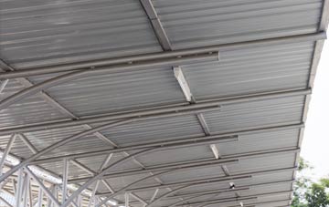 installing Mainsriddle metal roofing