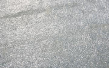 Mainsriddle laminate fibreglass or shingles?